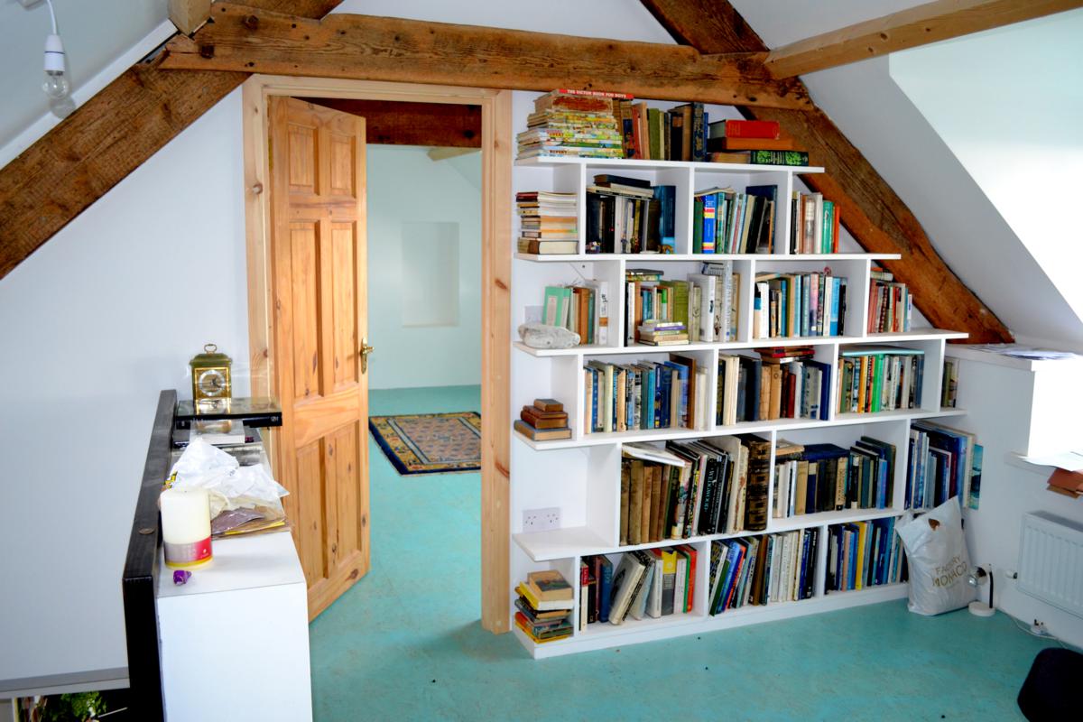 Bookcase under the roof