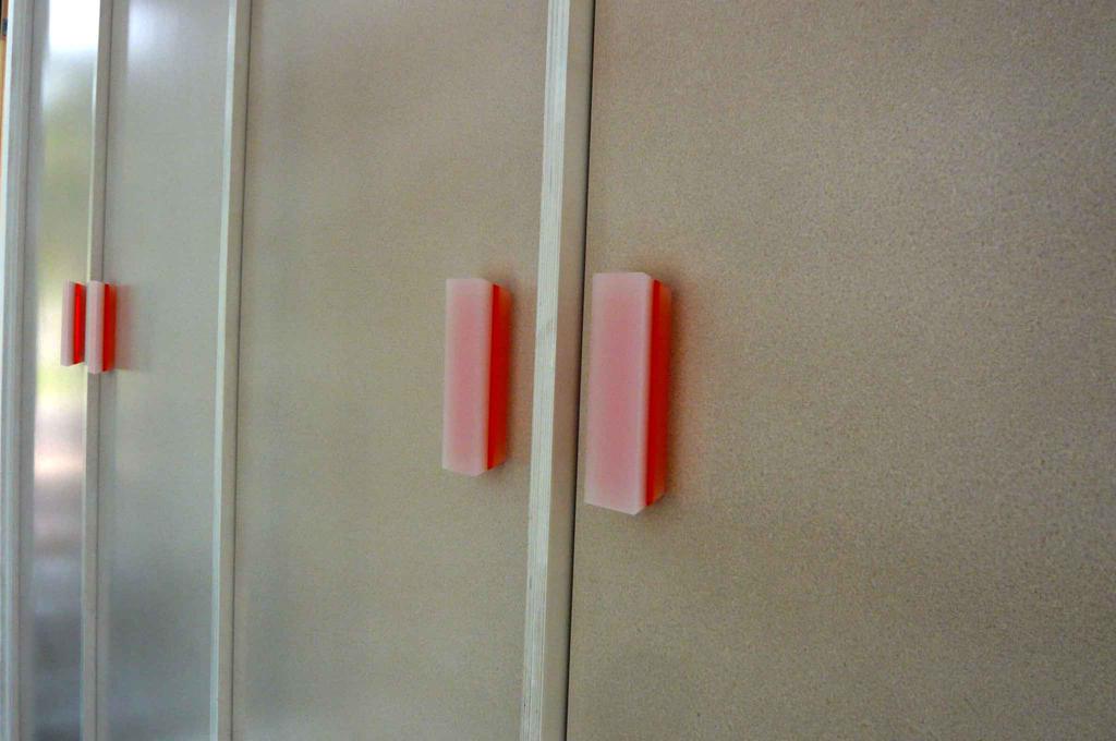 Cupboard doors and their handles