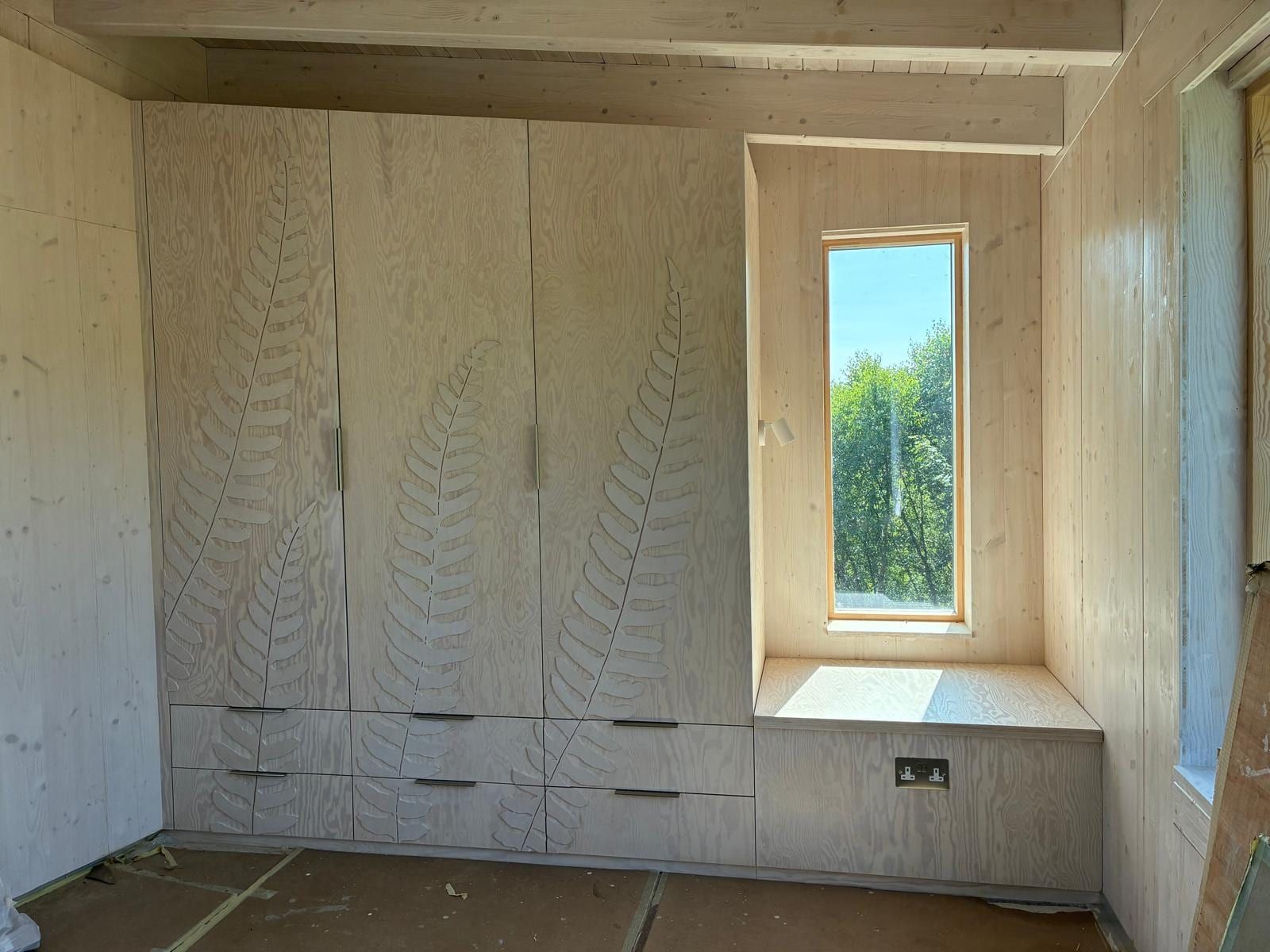 Wardrobe doors with a routed fern pattern