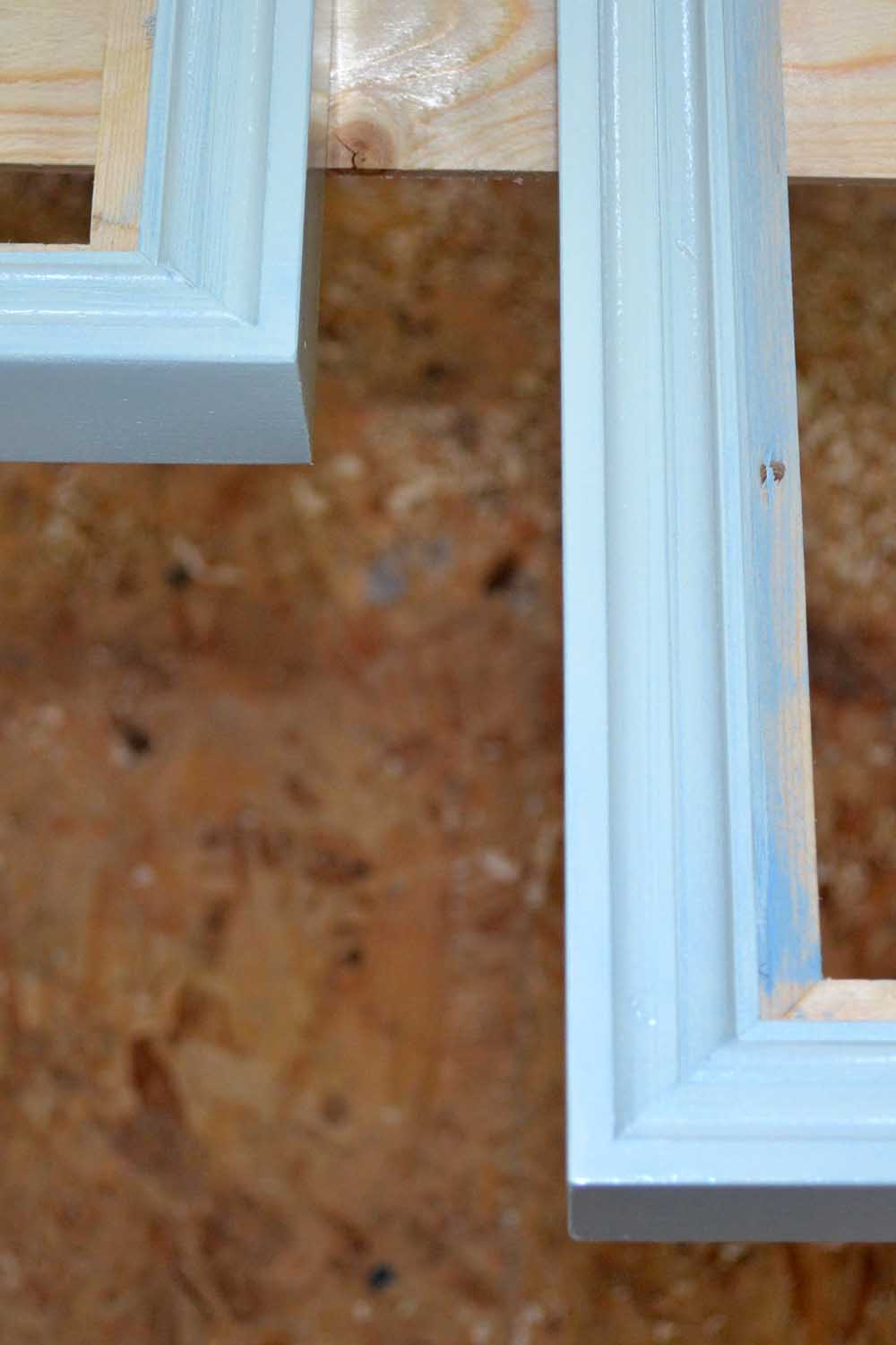 The corner of a painted frame