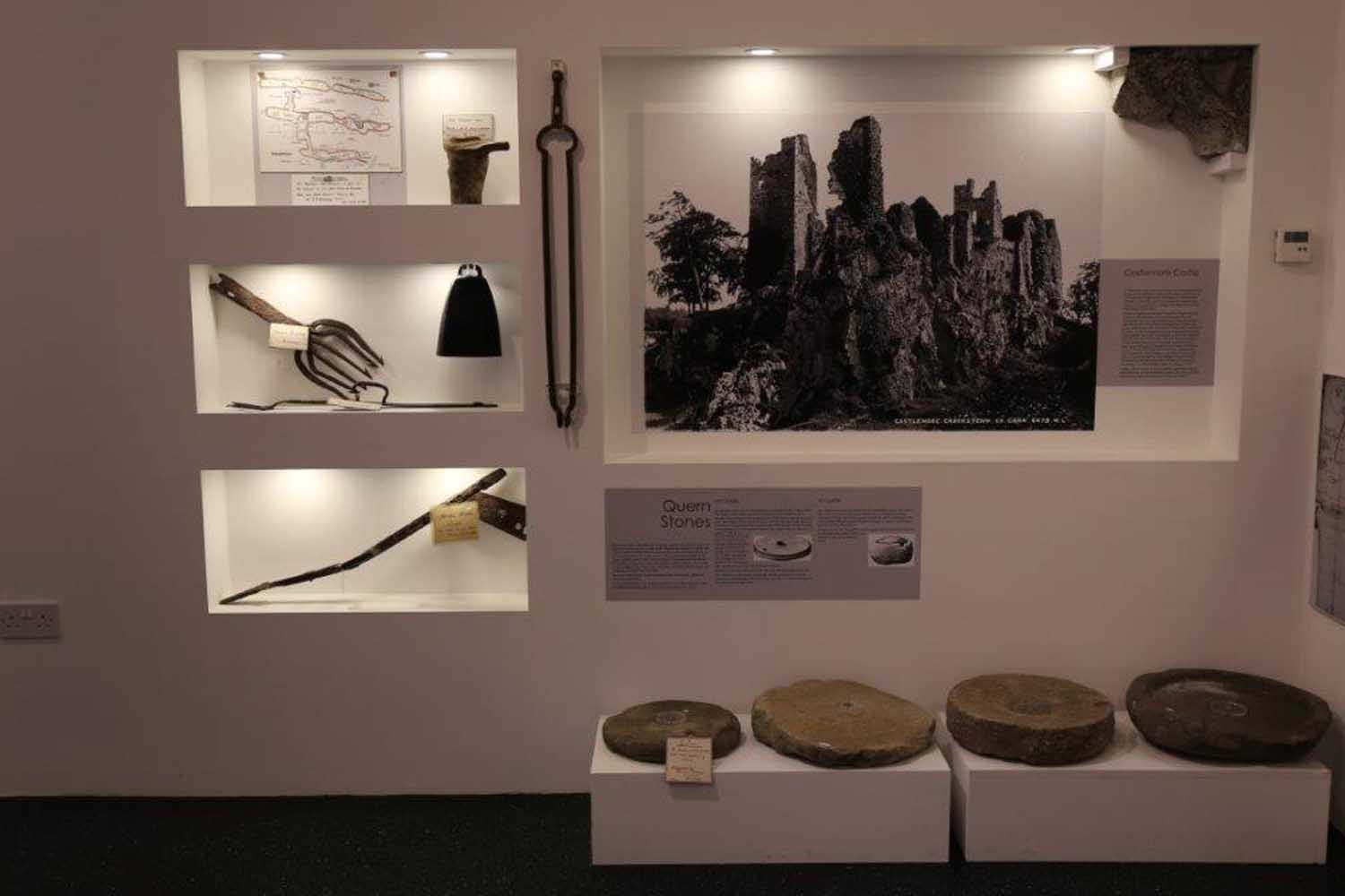Lit niches in a display wall